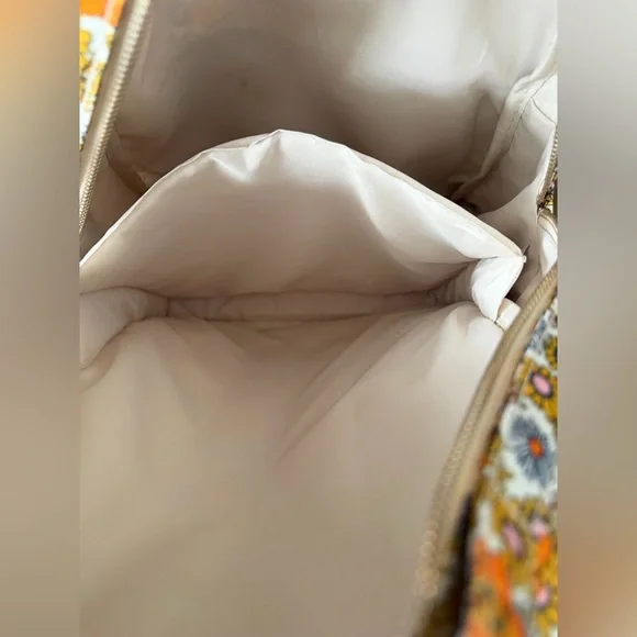 Add some color to your wardrobe with this Floral Orange and Yellow Backpack. - Picture 5 of 10